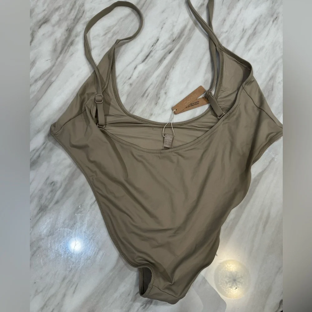 Skims swim cut out open bust one piece size 4x